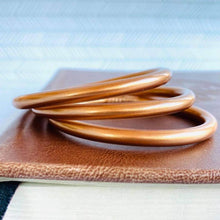 Load image into Gallery viewer, Matte Copper Dust Filled Thai Bangles Set of 3
